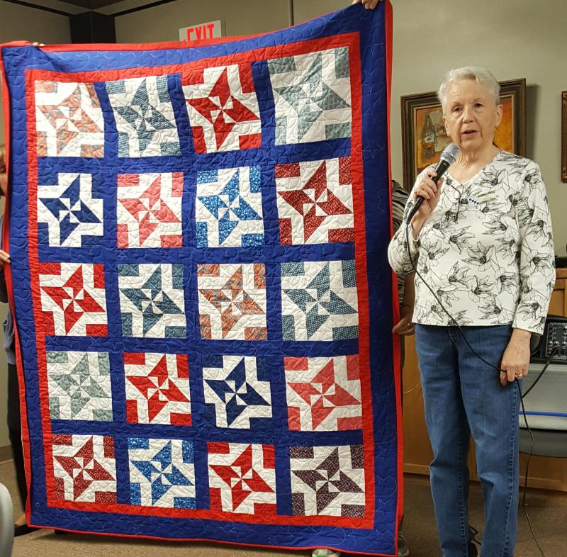 Tina and a quilt of valor