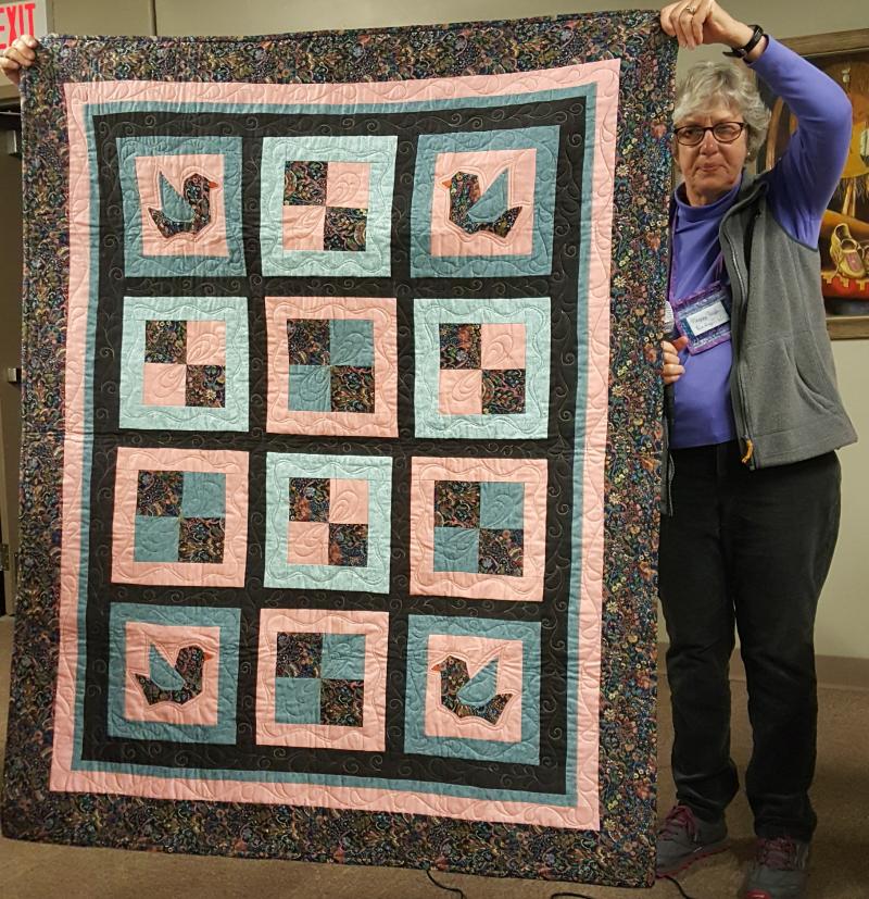 Wanda's quilts brought by Peg