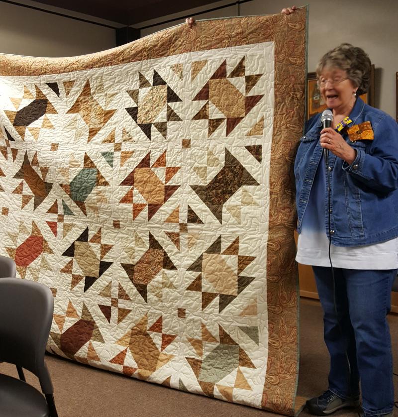 Sue with a lovely bed quilt.  