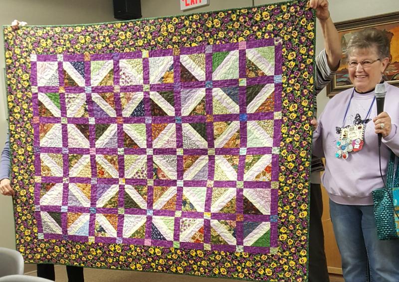  Shirley shows a scrap quilt w/flowers 