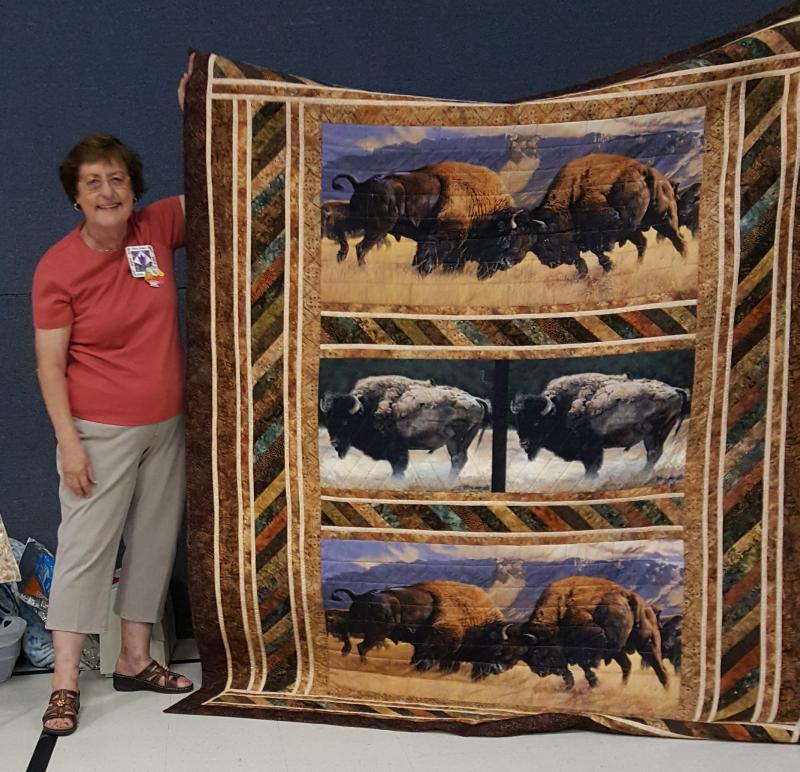 Patsy with a lovely buffalo panel quilt