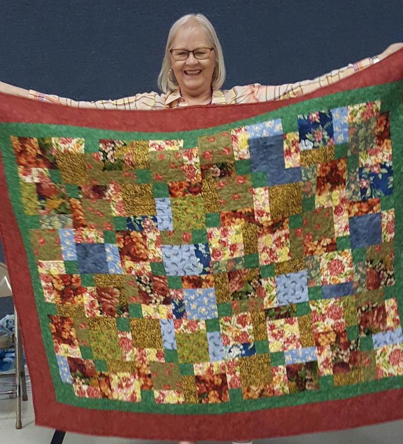 Barbara with a lovely floral quilt