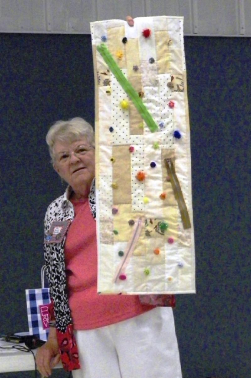 Ann K shows her Challenge quilt 