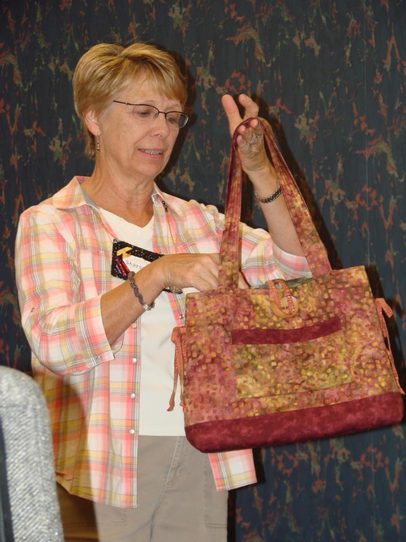 Sharon C's Bow and Tucks tote bag