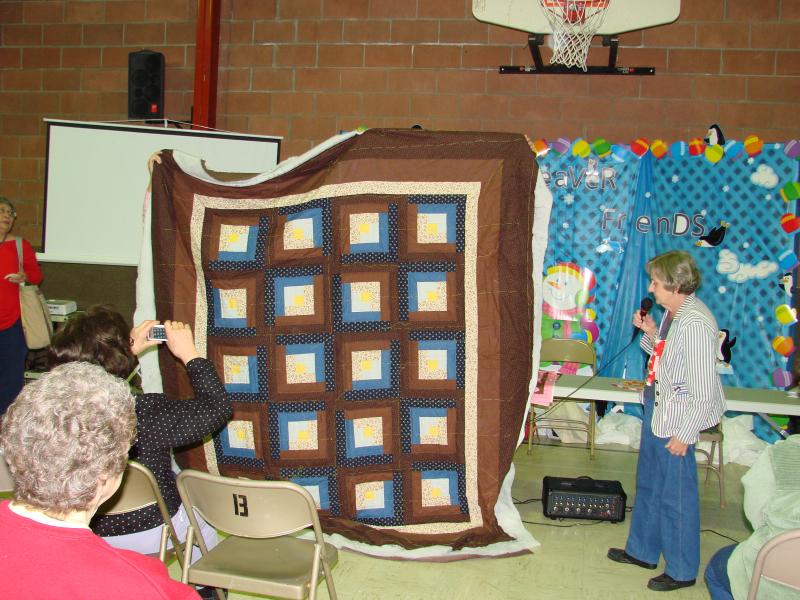 Diana's Log cabin quilt~hand quilting in progress!