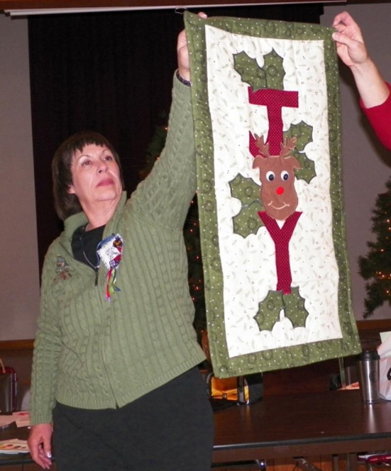 A Joy reindeer wall hanging  shown by Diane R.