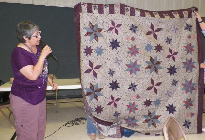 Irene H shows a Star Quilt