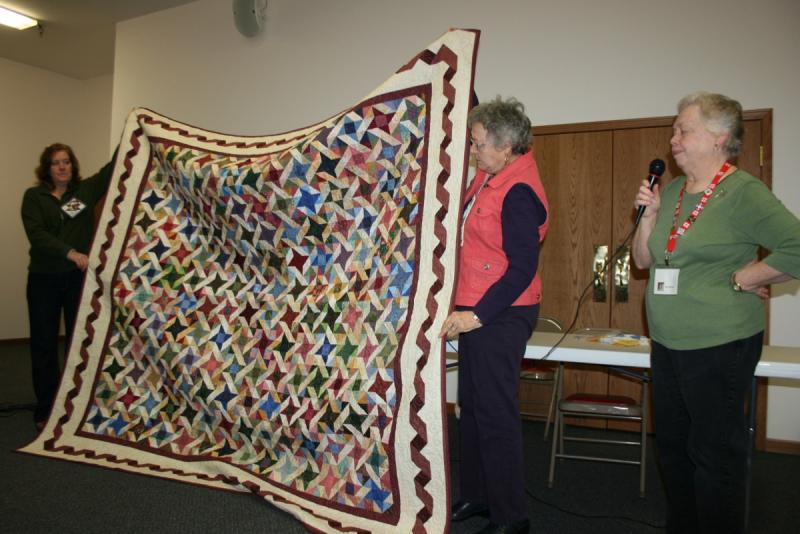 Alliance quilters-gift of raffle quilt for RSVP