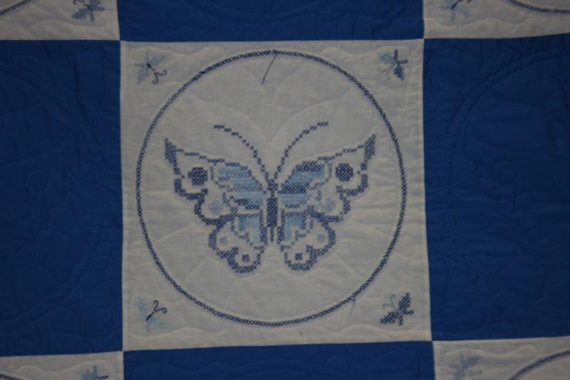 Janice's Blue & White cross stitched Anniversary Quilt made by her Aunt for her parents' 40th anniversary--close-up