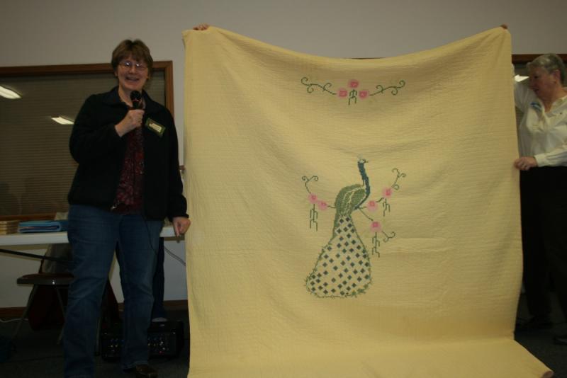 Diane's Peacock quilt made by her mother-in-law to give to her mother-in-law