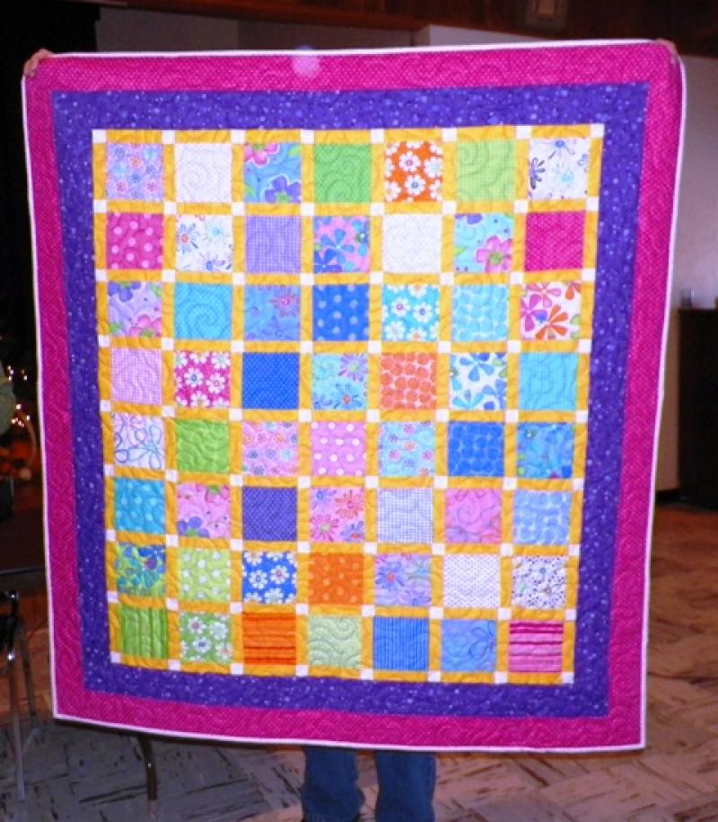 A quilt for granddaughter Riley shown by Jane P.
